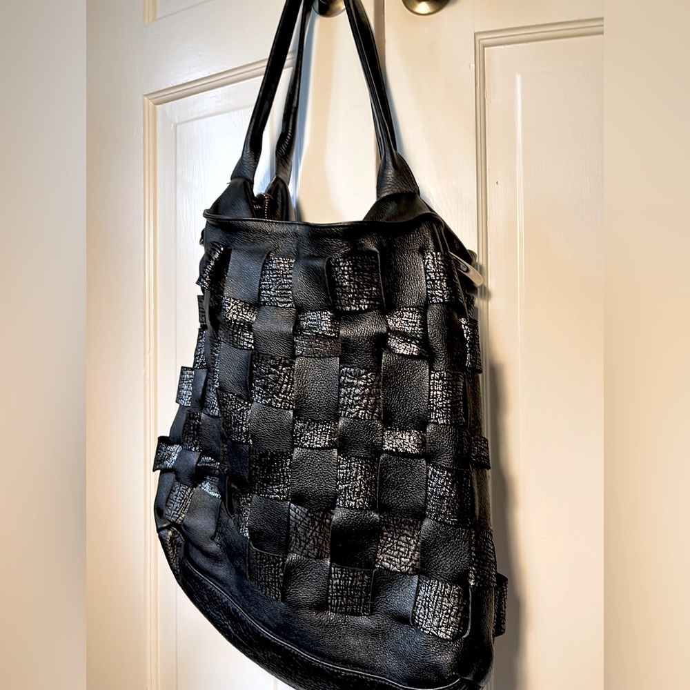 High end Italian leather bag. Unique woven distressed metallic leather detail